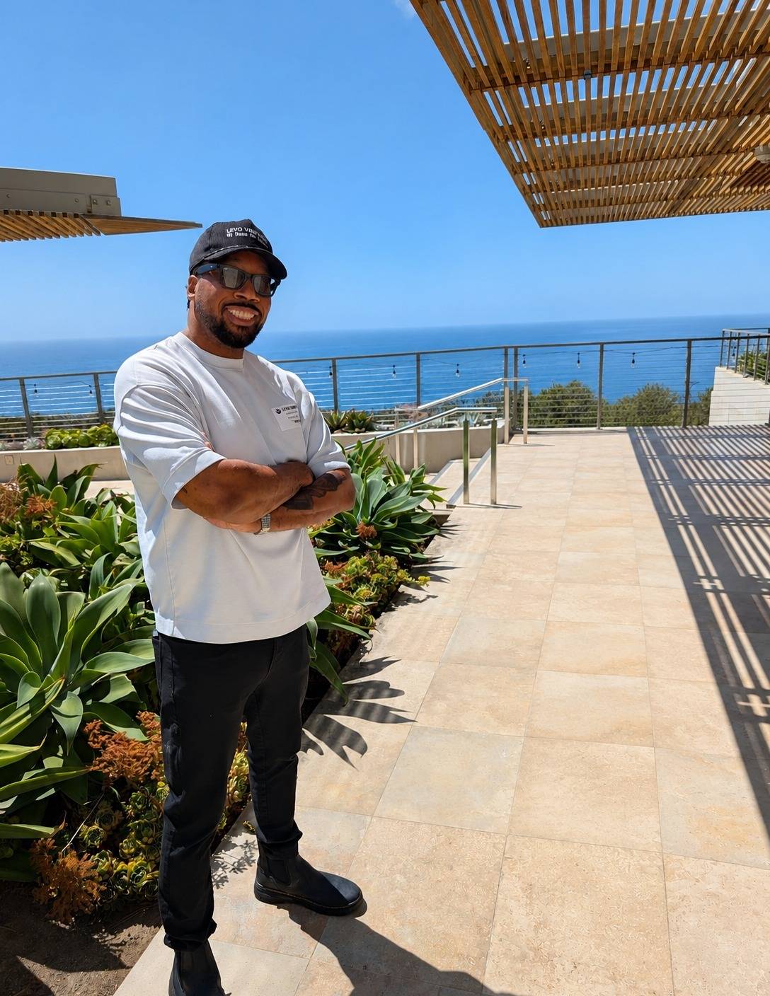 Chef Jason Fullilove on a terrace overlooking the ocean