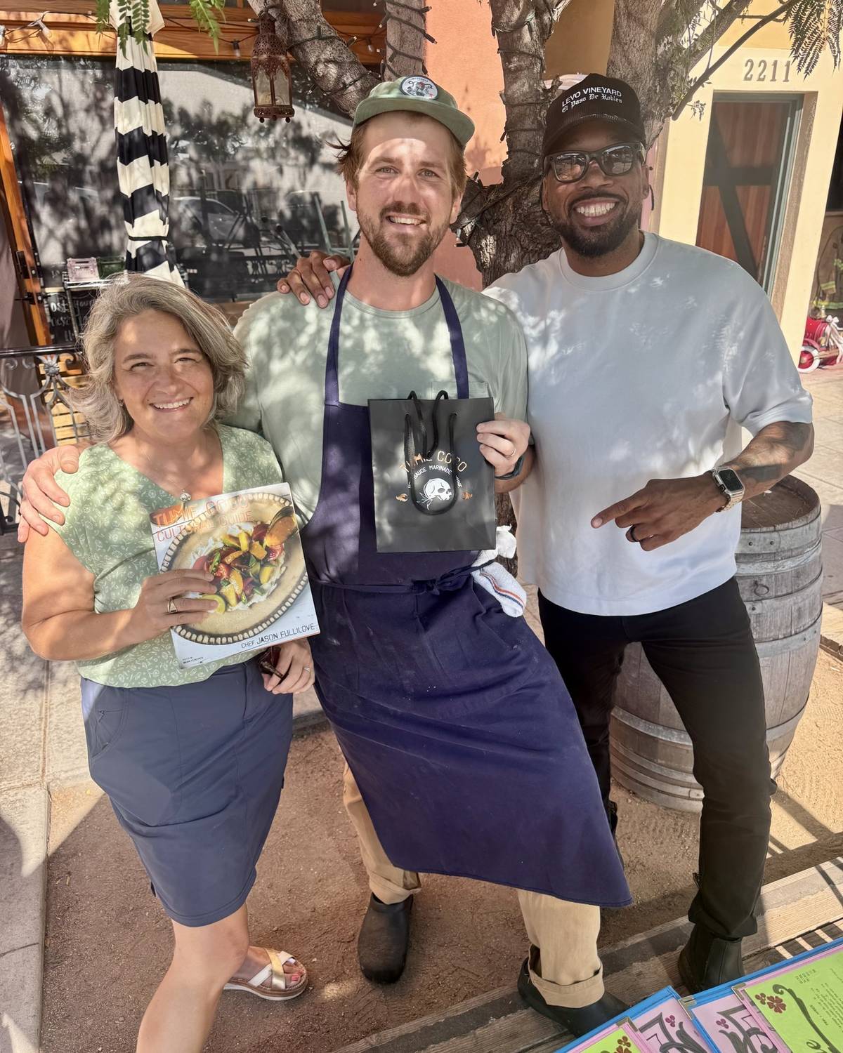 Chef Jason Fullilove with a chef and a guest